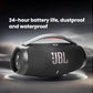 The black JBL Boombox 3 speaker highlighting its key durability features: 24-hour battery life and its dustproof and waterproof design.