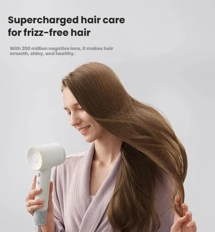 A woman with smooth, shiny, and healthy hair after using the Laifen SE 2, which provides supercharged hair care for frizz-free results with 200 million negative ions