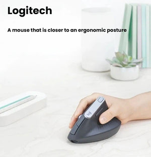 A person using the Logitech MX Vertical mouse on a desk, demonstrating its natural handshake position for improved ergonomic posture and comfort.
