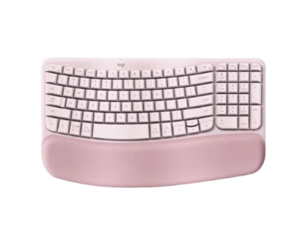 Top-down view of the rose pink Logitech Wave Keys wireless keyboard, highlighting the soft fabric wrist rest and unique wave curvature.