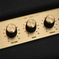 Marshall Acton III brass control knob close-up