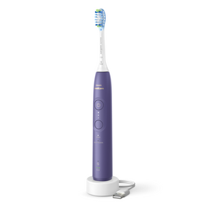 Philips Sonicare 5700 rechargeable toothbrush in Purple with its USB-A charging stand